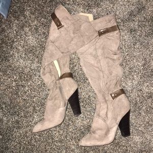 Knee high heeled boots